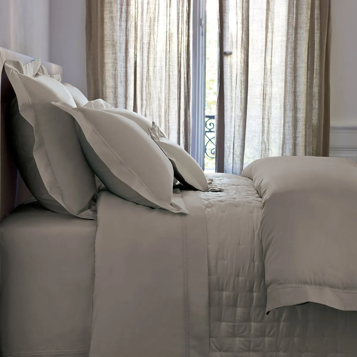 Triomphe Platine Quilted Coverlet by Yves Delorme